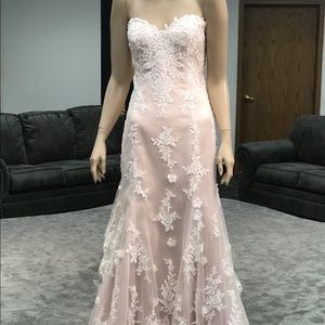 Maggie Sottero’s “Holly” bridal gown.. Ivory/Vintage color.. Size 14